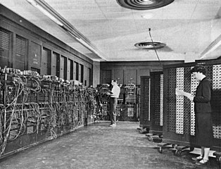 ENIAC in Philadelphia, Pennsylvania. Glen Beck (background) and Betty Snyder (foreground) program the ENIAC in building 328 at the Ballistic Research Laboratory